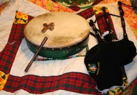 Brandi's pipes, bodhran and Holding Cross