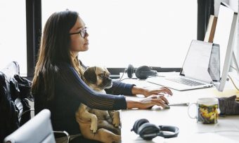 Woman with dog at work