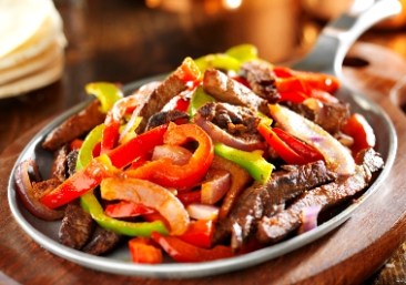 mexican food - beef fajitas and bell peppers