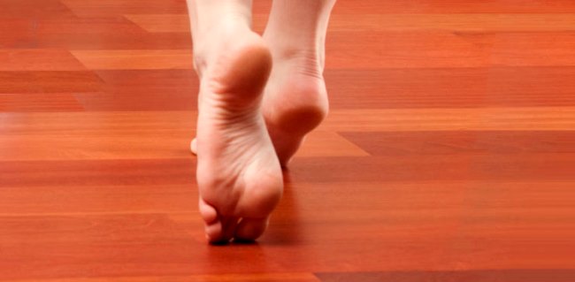 bare-feet-on-wood-floor